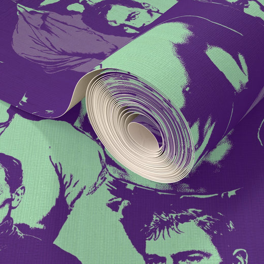 Two rolls of purple and green graphic portrait wallpaper side by side