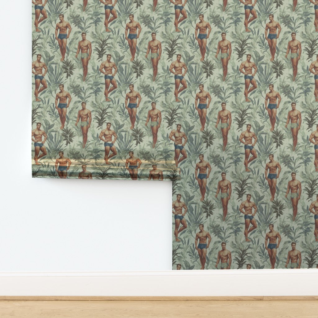 Living space styled with the tropical Palm green wallpaper.