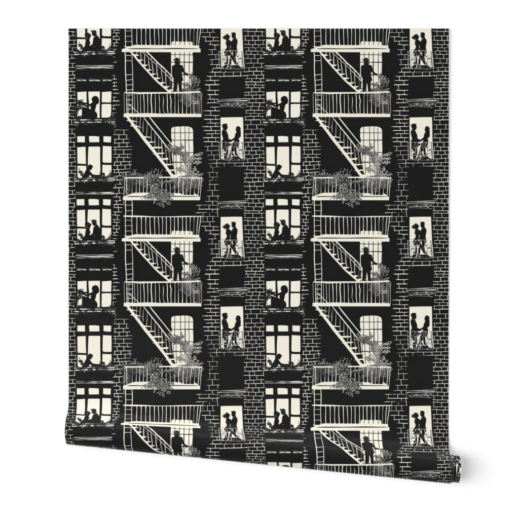 Tex in the City wallpaper roll in black and ivory displayed on a wall