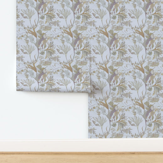 Detailed close-up of the delicate botanical wallpaper pattern.
