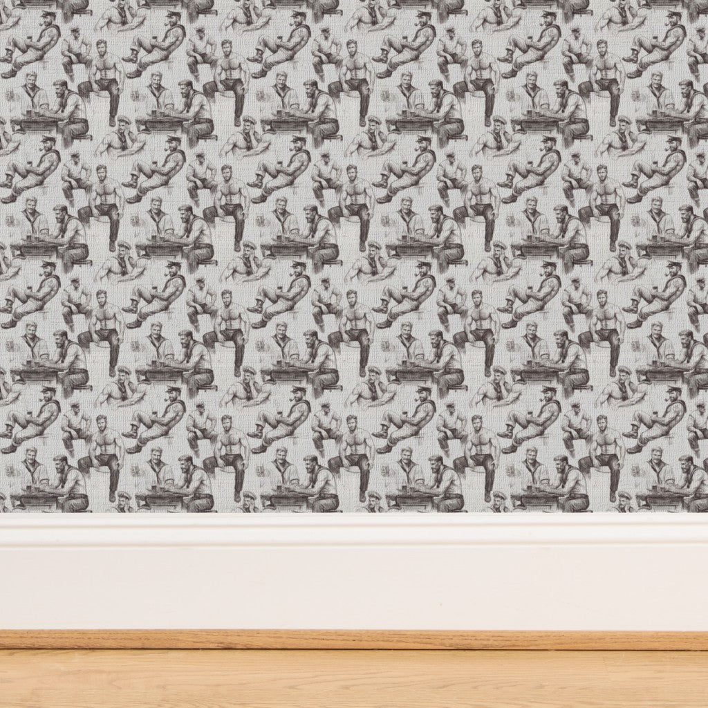 Detailed view of stylized sailor character on artisan wall covering.