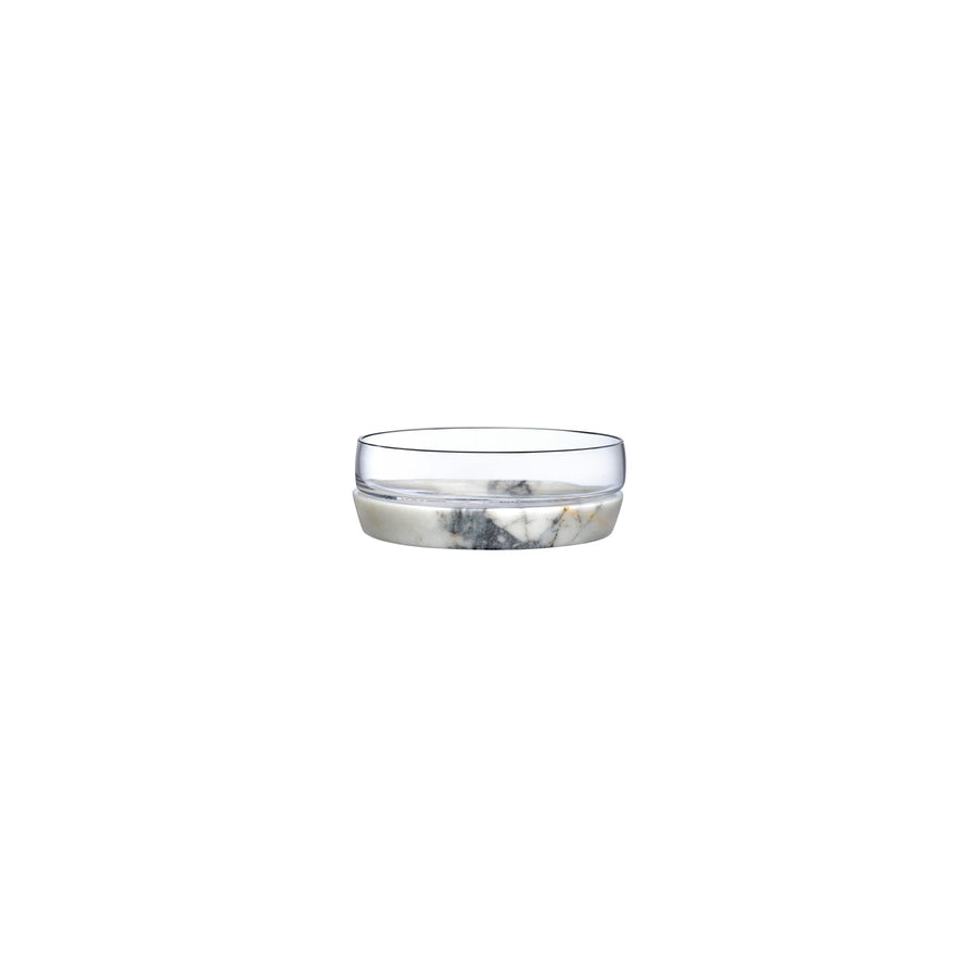 Medium modernist glass bowl resting on a solid round marble base against a clean white background.