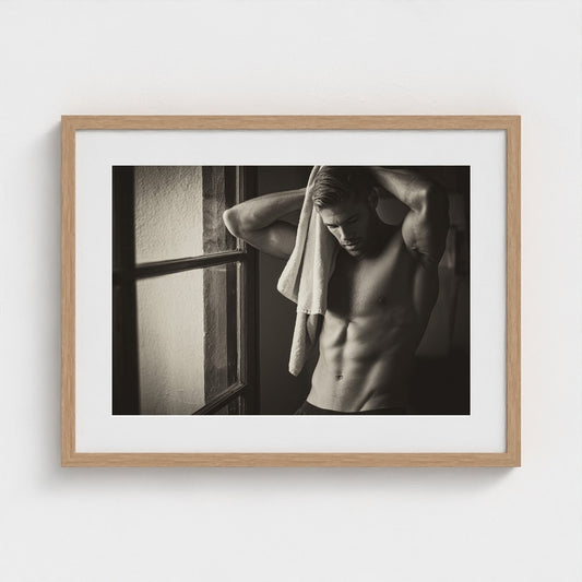 Contemplative Man Drying Hair in Sepia Toned Light