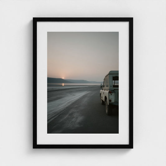 Vintage Land Rover at Serene Coastal Sunset View