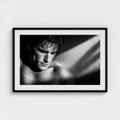 Contemplative Masculine Portrait in Grayscale Light