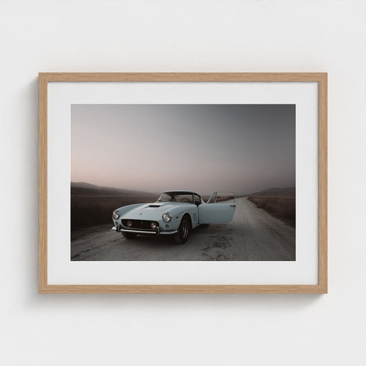 Vintage Blue Ferrari on Hazy Mountain Road Photography