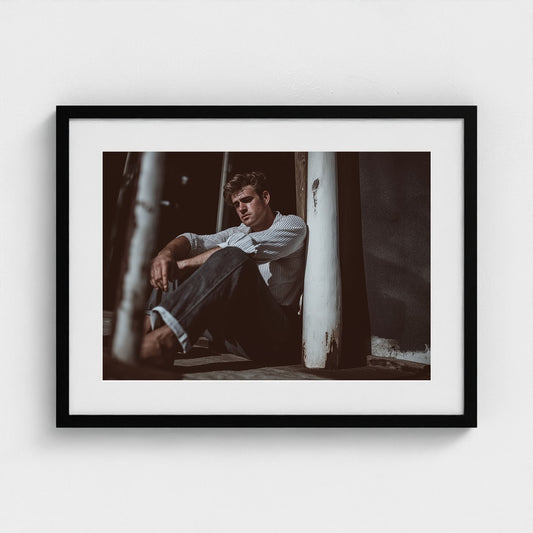 Contemplative Male Portrait in Soft Neutral Tones