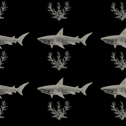Modern home office interior featuring the dark Solo Swimmer wallpaper for a tailored, graphic look.