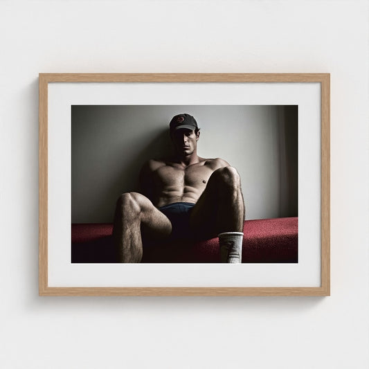 Contemplative Male Portrait in Shadowed Grey Tones