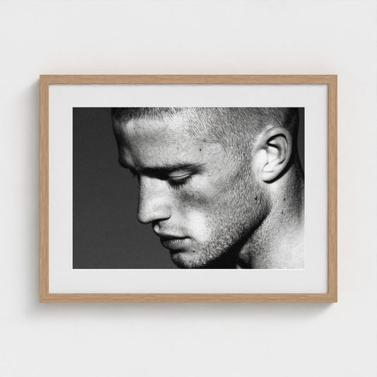 Contemplative Male Portrait in Soft Grey Tones