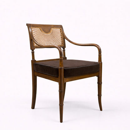 Wooden armchair with woven backrest on a white background