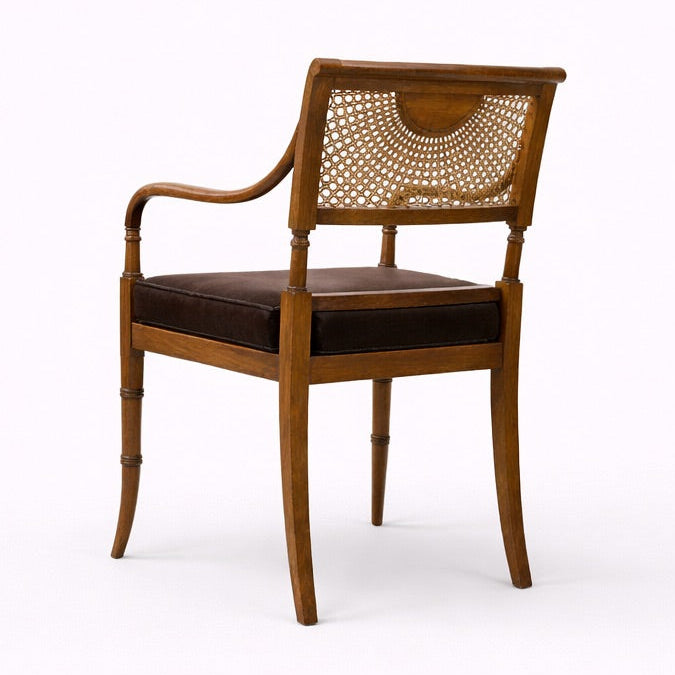 Wooden chair with woven backrest on a white background