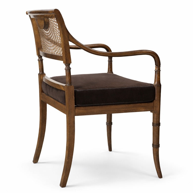 Wooden chair with brown cushion on a white background