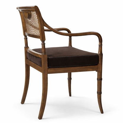 Wooden chair with brown cushion on a white background