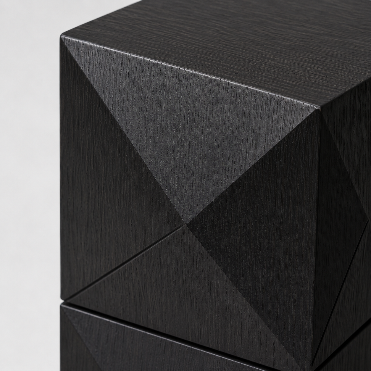 Bespoke low wooden pedestal showcasing precise joinery and sophisticated diamond grain.