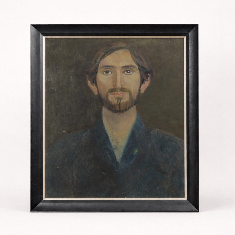 Framed portrait painting of a man with a beard on a white background