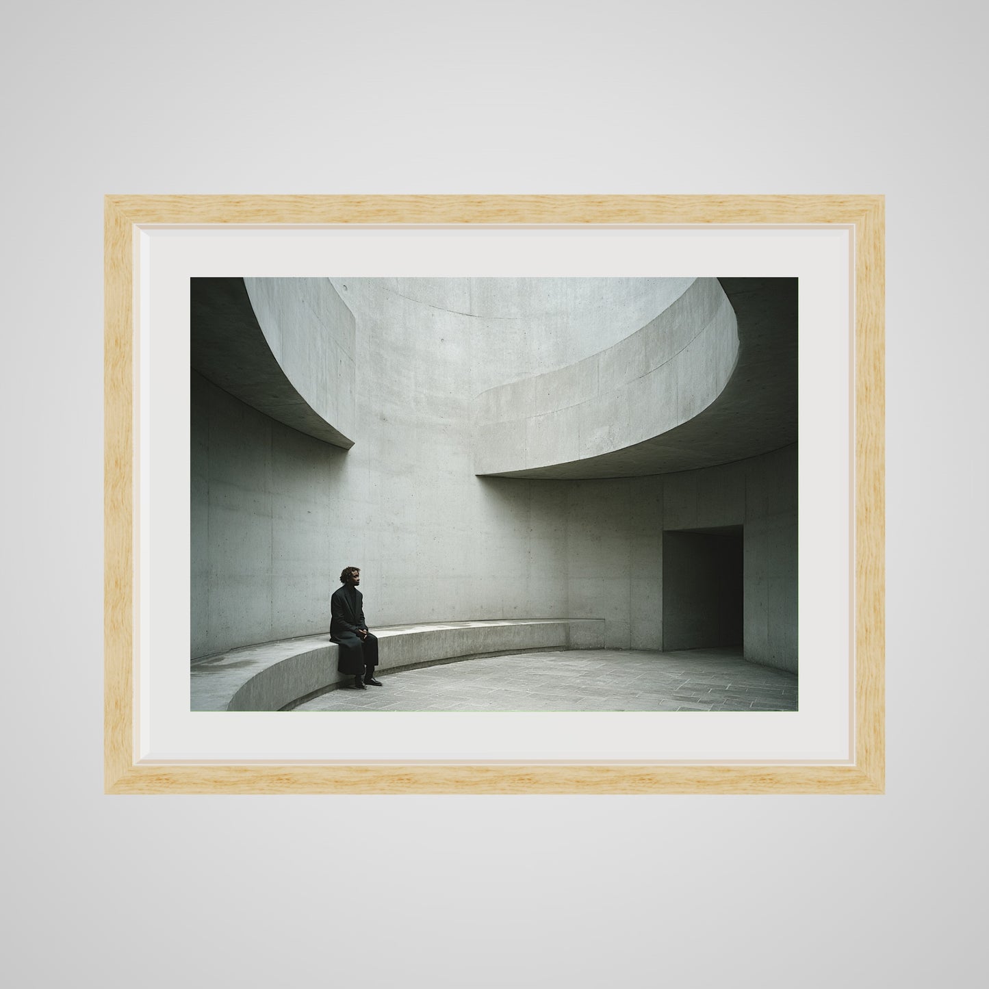 Front view of minimalist concrete curves art in a 24x18 deep natural oak spacer frame