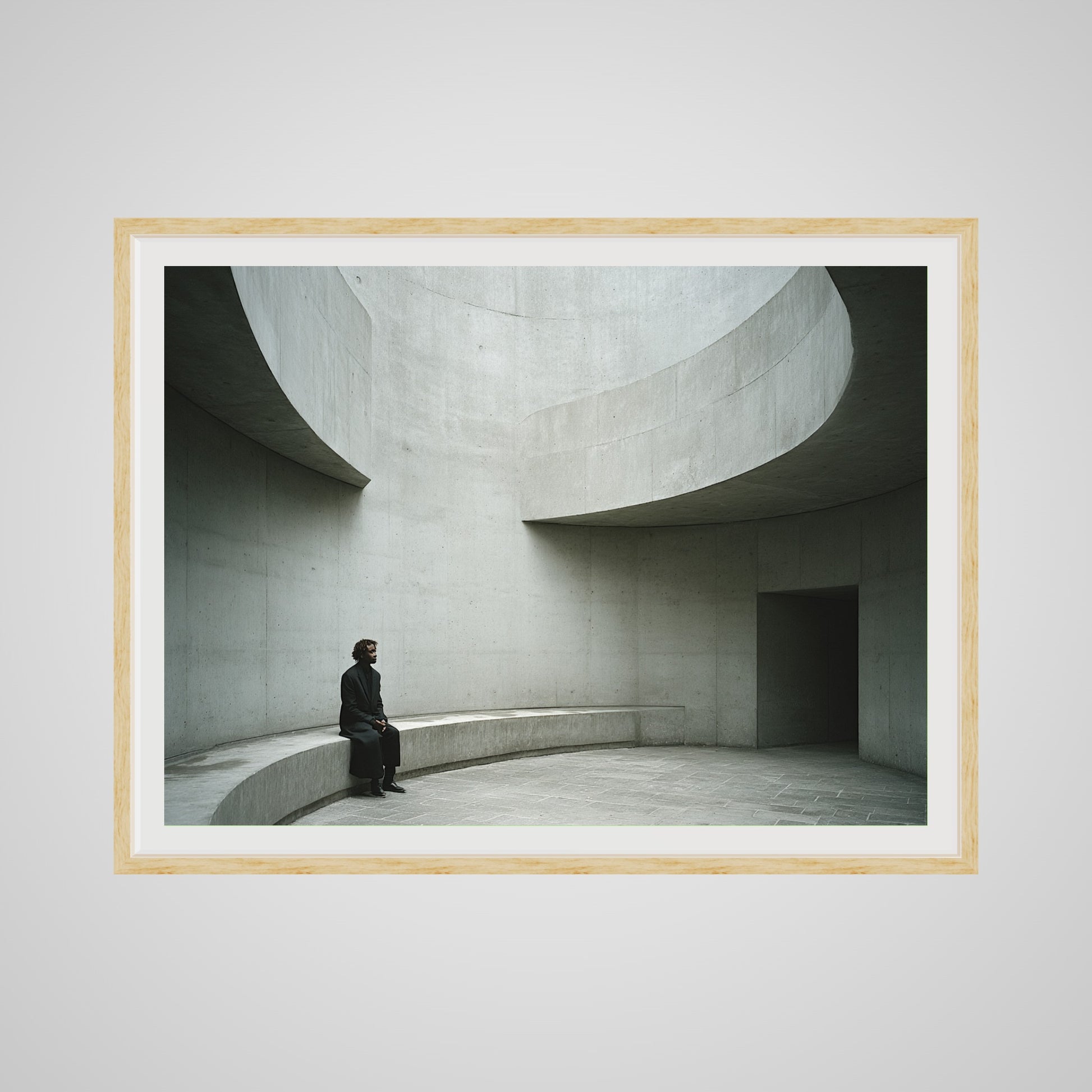 Front view of large minimalist figure print in a 48x36 deep natural oak spacer frame