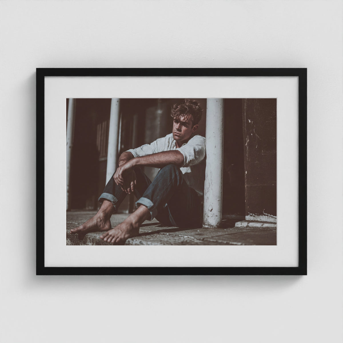 Contemplative Male Portrait in Soft Neutral Tones 24x18 Black Box Frame Mockup