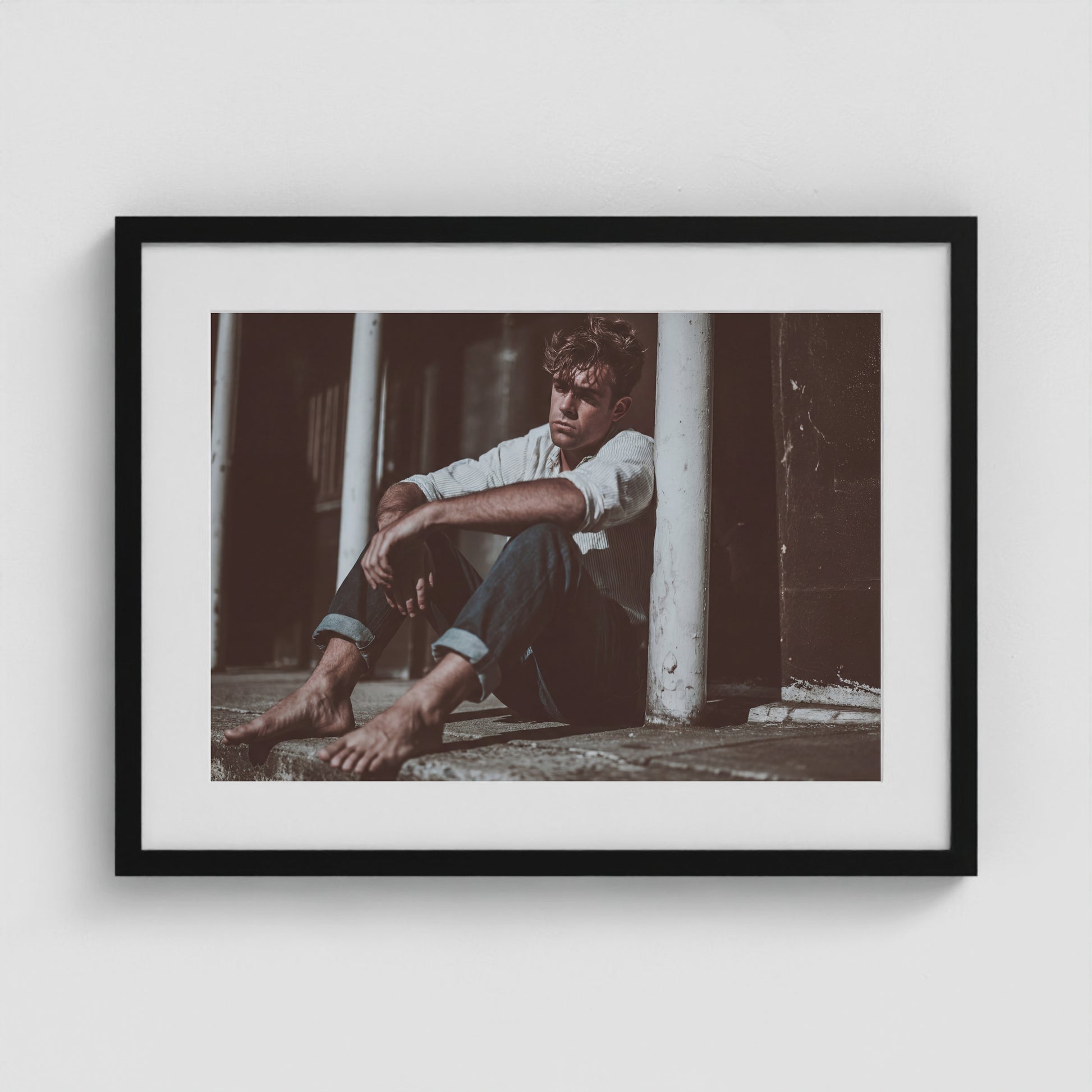 Contemplative Male Portrait in Soft Neutral Tones 24x18 Black Box Frame Mockup