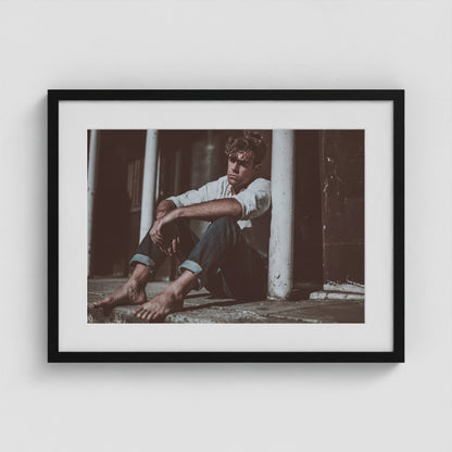 Contemplative Male Portrait in Soft Neutral Tones 24x18 Black Box Frame Mockup