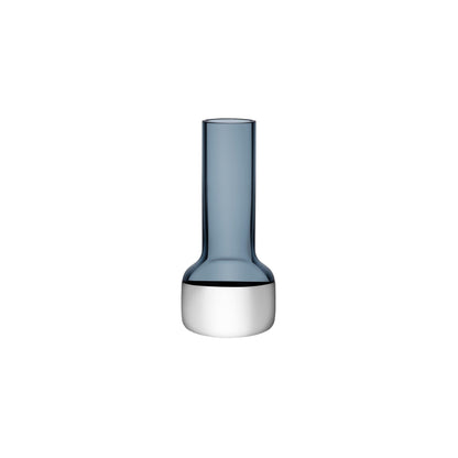 Minimalist mouth-blown glass bud vase in steel blue against a neutral background.