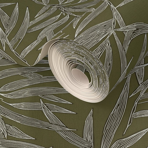 Angle shot showing the organic fiber texture of the Olive Bamboo grasscloth wallpaper.