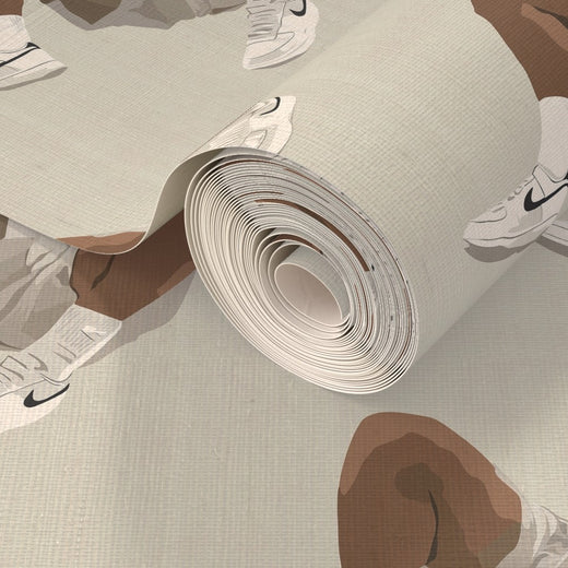 A roll of White Kicks wallpaper printed on woven natural fiber grasscloth substrate.