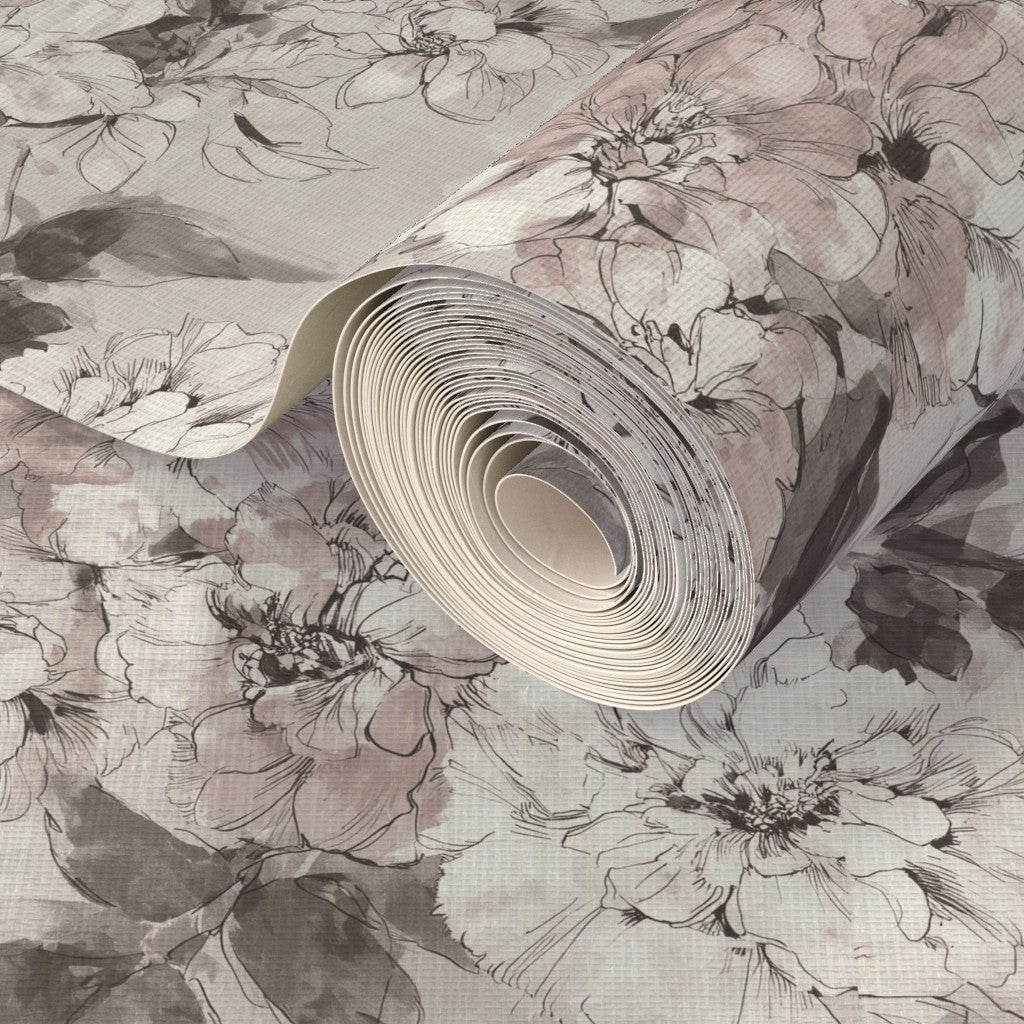Close-up of organic grass cloth texture on neutral floral wallpaper.