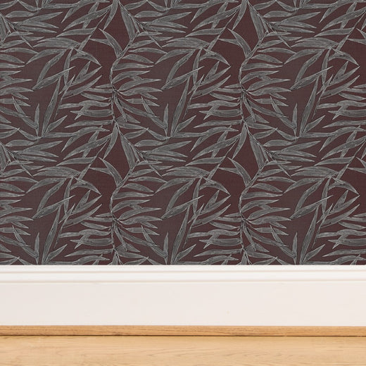 Detail of the organic texture of grasscloth wallpaper with bamboo leaves.