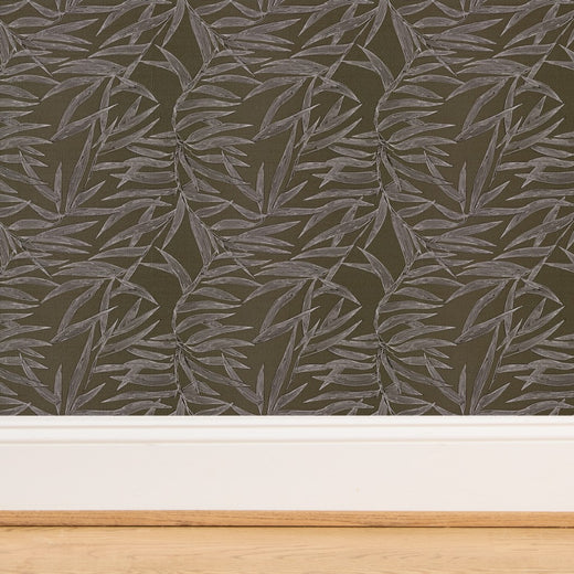 Close-up of natural woven fibers on pewter grey bamboo wallpaper.