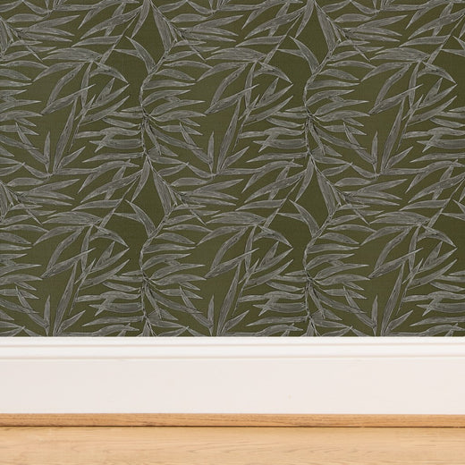 Close-up detail of the textured grasscloth weave on the Olive green Bamboo wallpaper.