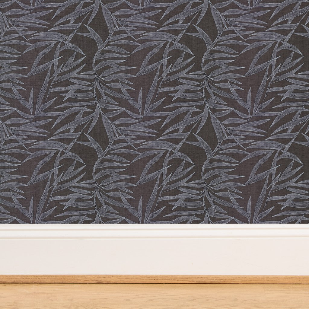 Detailed view of natural woven grasscloth backing on Taupe bamboo wallpaper.