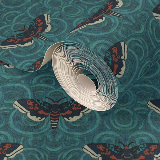 Texture detail of Velvet Wings grasscloth wallpaper showing natural fibers and rich teal tones.