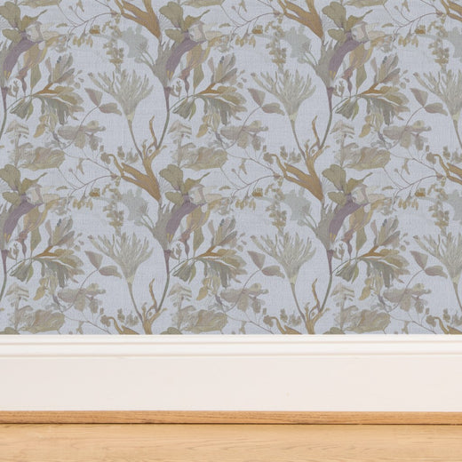Detailed textured view of the natural grasscloth backing on foliage wallpaper.
