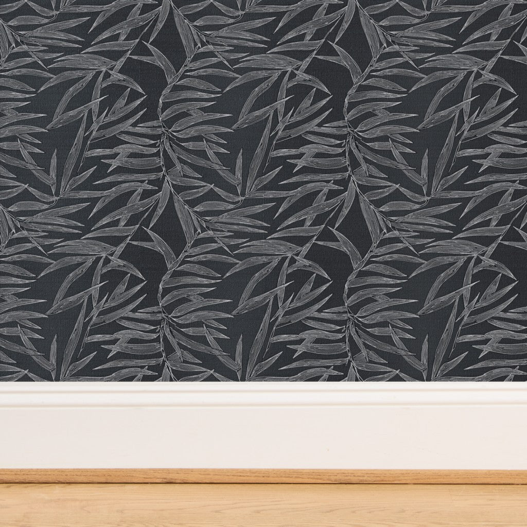 Detailed close-up of natural grasscloth backing on Smoke bamboo wallpaper.