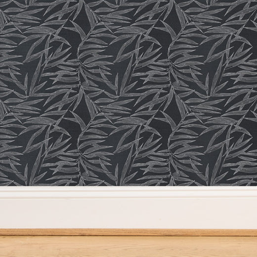 Detailed close-up of natural grasscloth backing on Smoke bamboo wallpaper.
