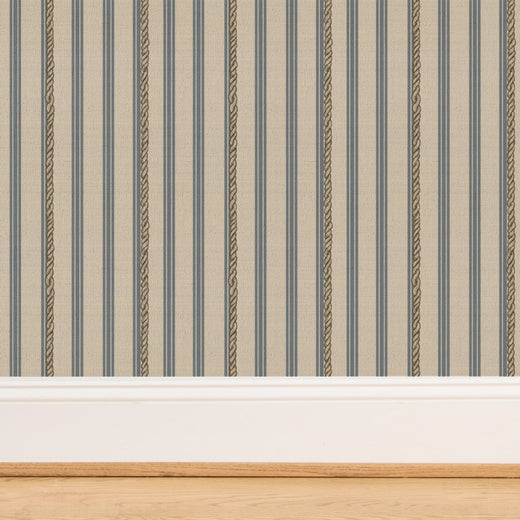 Close-up of blue stripe wallpaper on organic woven grass cloth textile