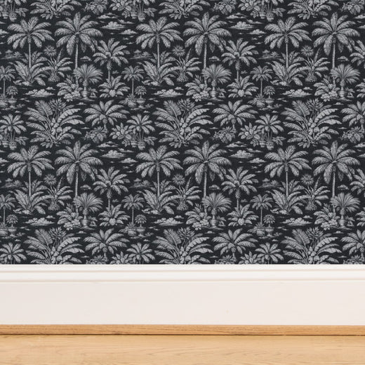 Lush tropical toile design on Black grass cloth wallpaper with rich organic weave.