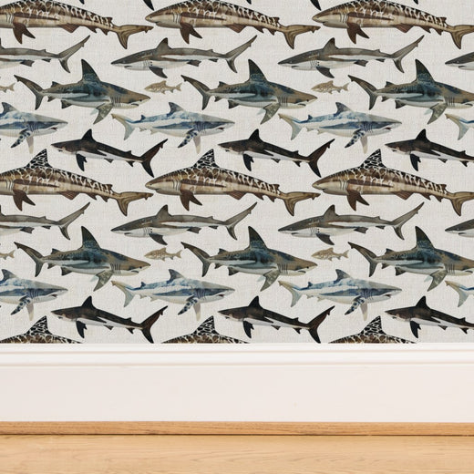 Watercolor Sharks wallpaper on textured grasscloth substrate, featuring coastal blue hues