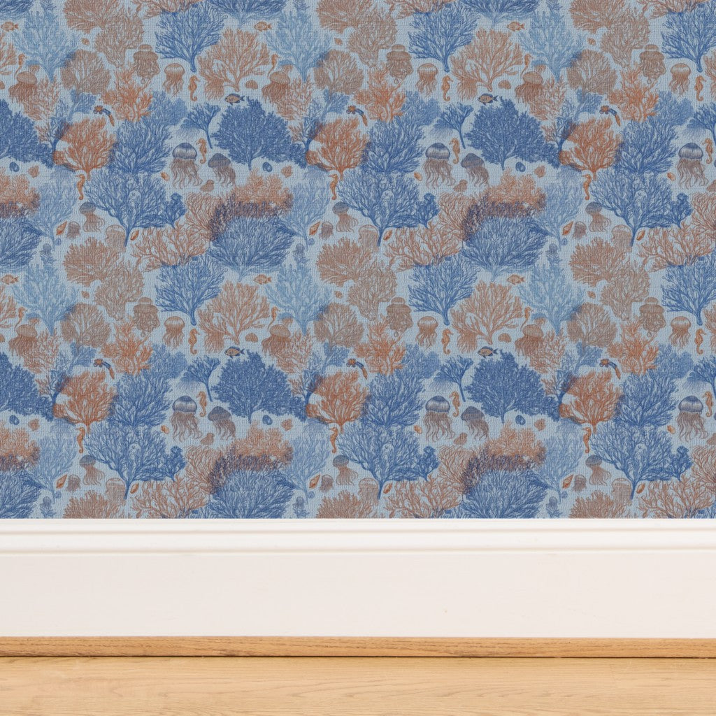 Detailed view of the woven organic texture of Coastal Blue grasscloth Jelly Reef wallpaper.