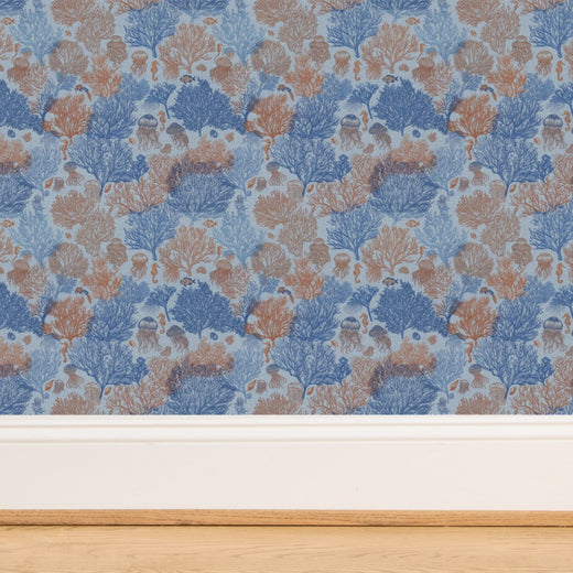 Detailed view of the woven organic texture of Coastal Blue grasscloth Jelly Reef wallpaper.