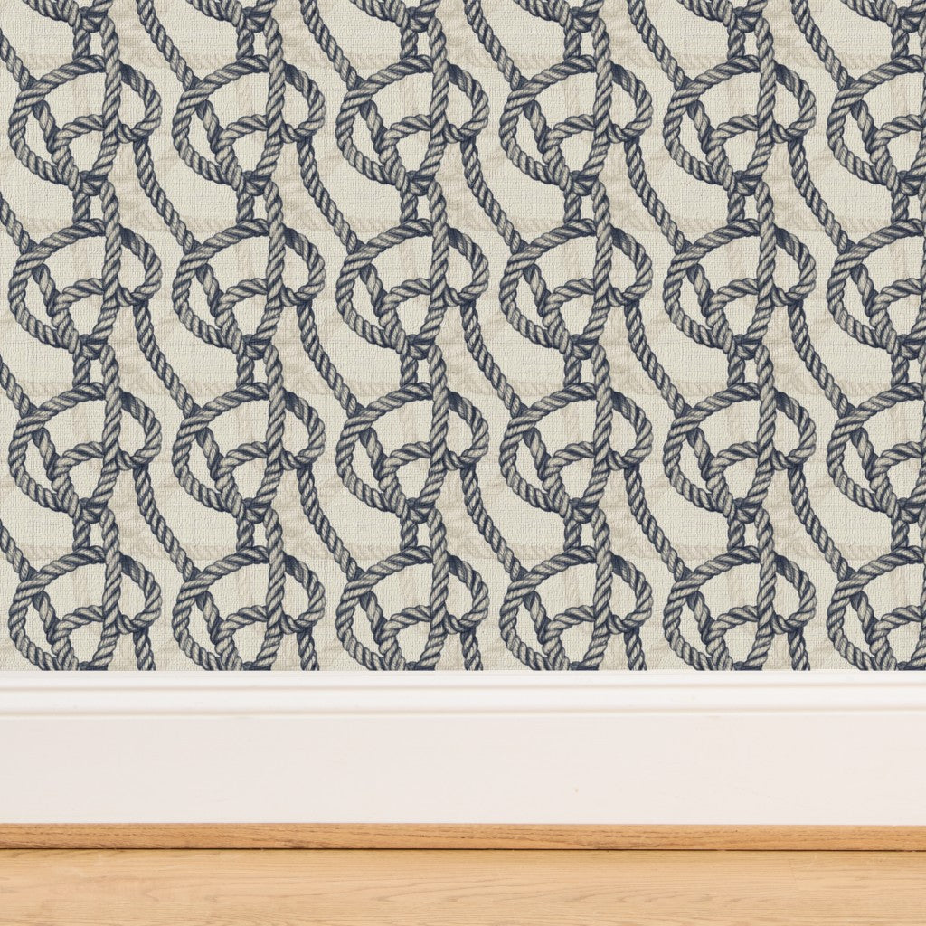 Close-up of the organic grasscloth substrate for Harbor Knot navy rope wallpaper