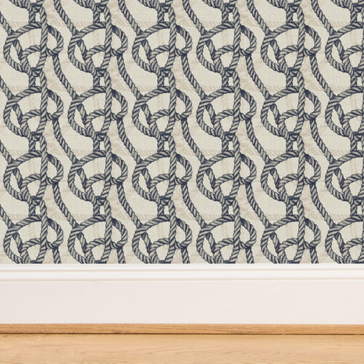 Close-up of the organic grasscloth substrate for Harbor Knot navy rope wallpaper