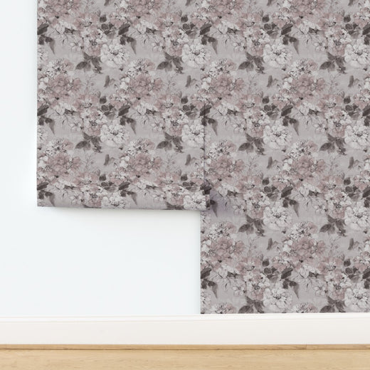 Woven grass cloth wallpaper sample with taupe watercolor floral pattern.