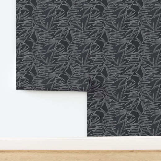 Woven grasscloth texture on Smoke charcoal botanical bamboo wallpaper.
