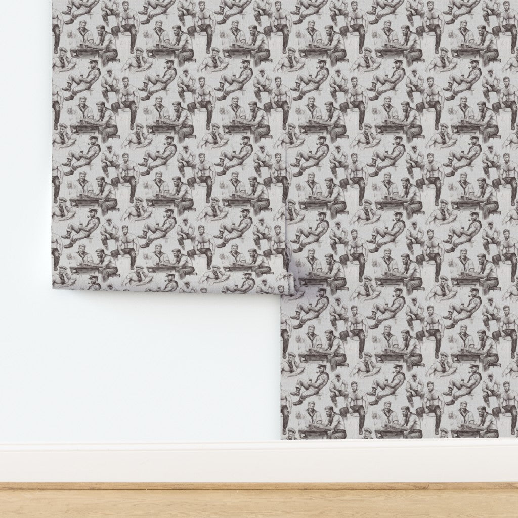 Textured natural grasscloth wallpaper swatch with navy maritime repeat pattern.