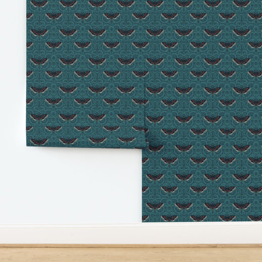 Velvet Wings wallpaper printed on natural grasscloth substrate with visible organic weave.