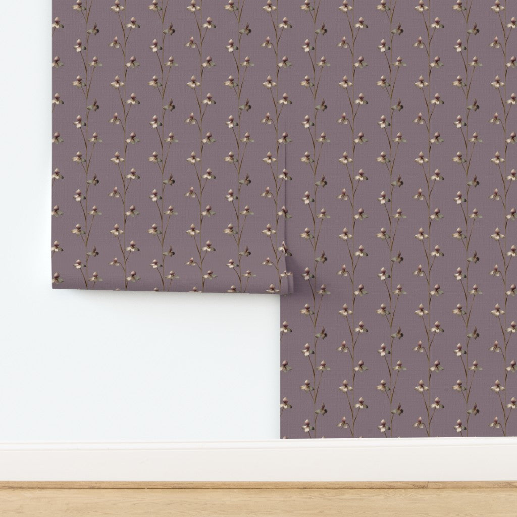 Woven natural grasscloth texture of the Twilight Bloom botanical wallpaper.