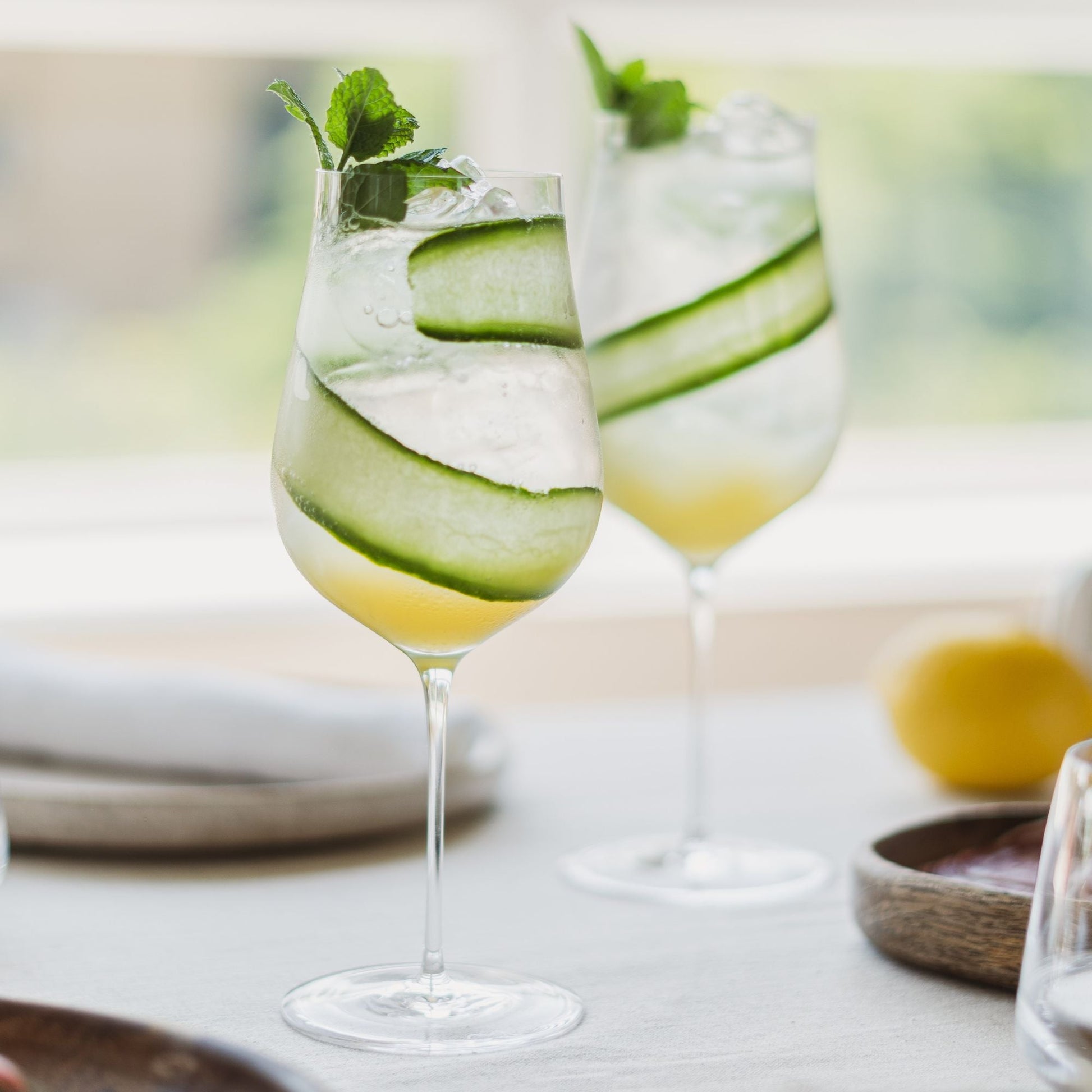 Close-up of the delicate, thin-walled bowl of the Ghost Zero Tulip white wine glass.